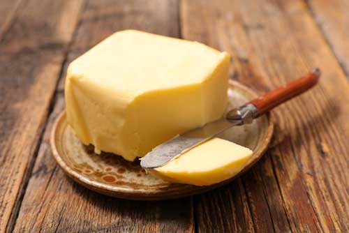 Butter is a fat source which traditionally has been added to coffee or tea to provide energy.